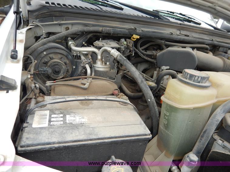 image for item J6380 2000 Ford F350 Crew Cab flatbed pickup truck