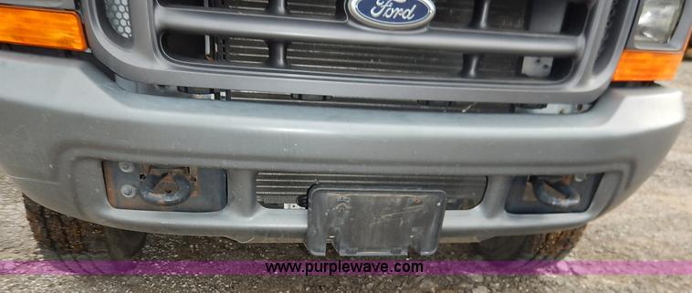 image for item J6380 2000 Ford F350 Crew Cab flatbed pickup truck