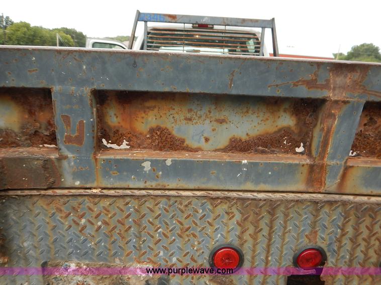 image for item J6380 2000 Ford F350 Crew Cab flatbed pickup truck