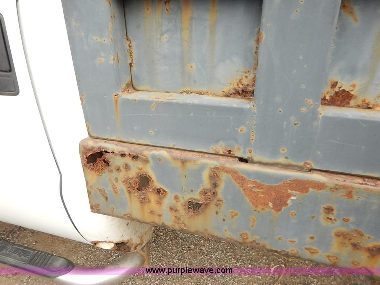 image for item J6380 2000 Ford F350 Crew Cab flatbed pickup truck