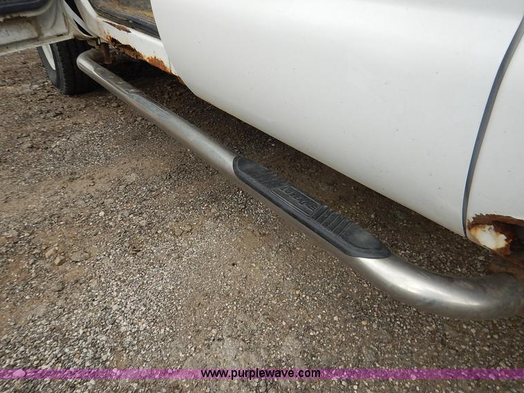 image for item J6380 2000 Ford F350 Crew Cab flatbed pickup truck