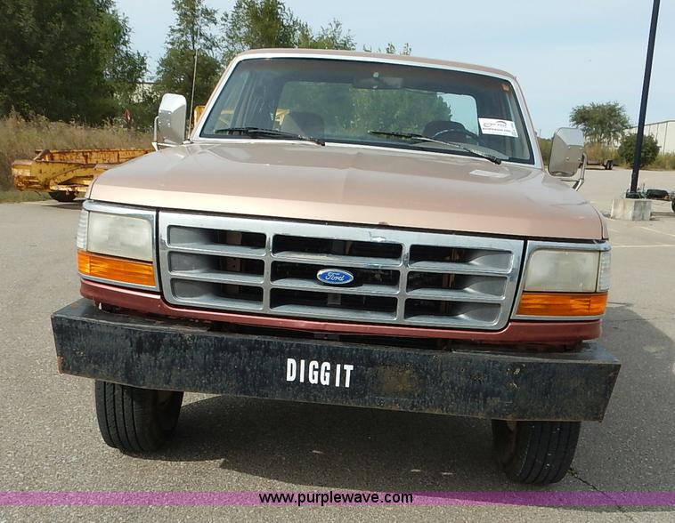 image for item K1695 1994 Ford F250 HD XLT SuperCab flatbed pickup truck