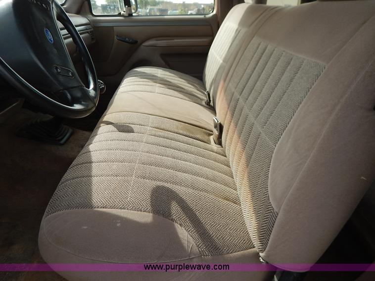 image for item K1695 1994 Ford F250 HD XLT SuperCab flatbed pickup truck