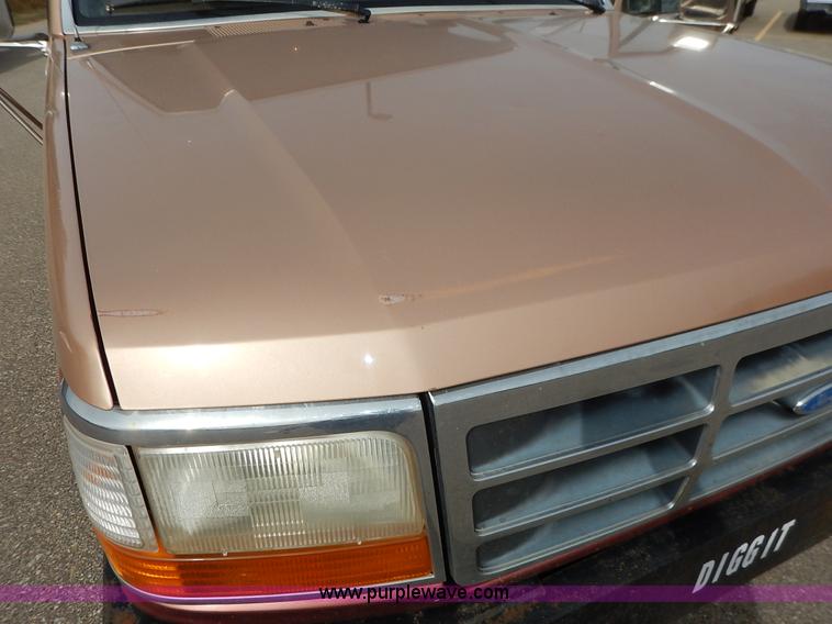 image for item K1695 1994 Ford F250 HD XLT SuperCab flatbed pickup truck
