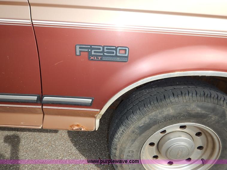image for item K1695 1994 Ford F250 HD XLT SuperCab flatbed pickup truck