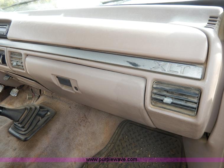 image for item K1695 1994 Ford F250 HD XLT SuperCab flatbed pickup truck