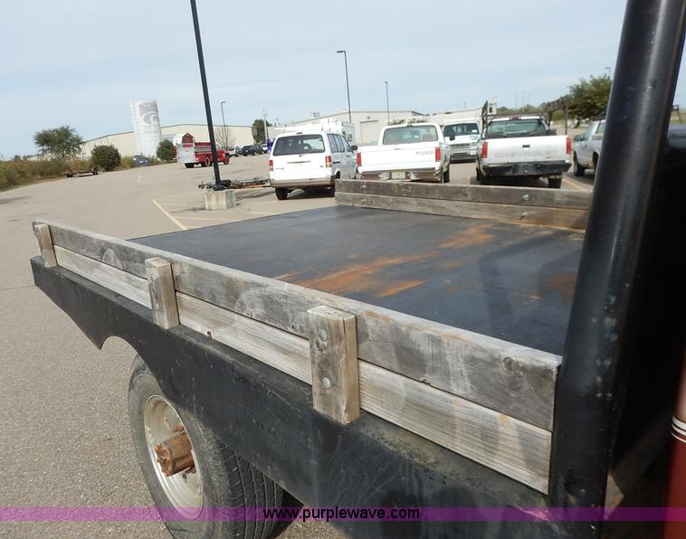 image for item K1695 1994 Ford F250 HD XLT SuperCab flatbed pickup truck