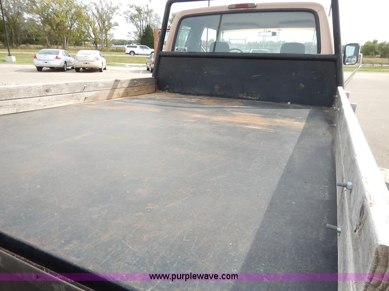 image for item K1695 1994 Ford F250 HD XLT SuperCab flatbed pickup truck