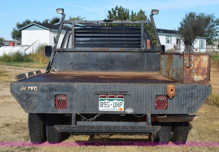 image for item L5003 1986 Ford F350 Crew Cab flatbed pickup truck