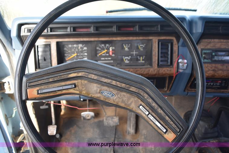 image for item L5003 1986 Ford F350 Crew Cab flatbed pickup truck