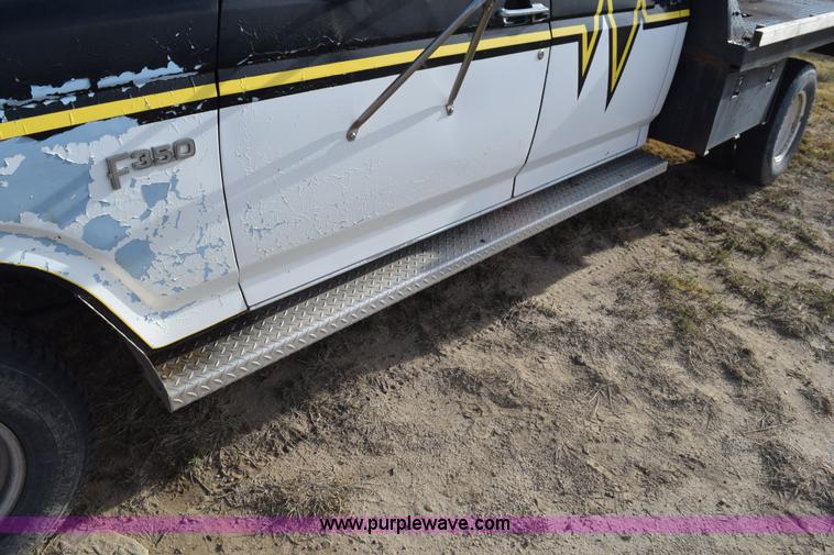 image for item L5003 1986 Ford F350 Crew Cab flatbed pickup truck