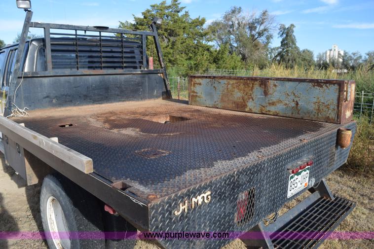 image for item L5003 1986 Ford F350 Crew Cab flatbed pickup truck