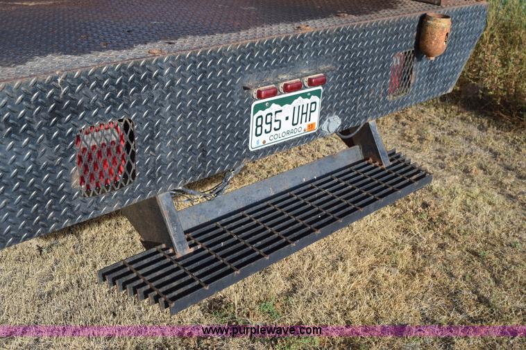 image for item L5003 1986 Ford F350 Crew Cab flatbed pickup truck