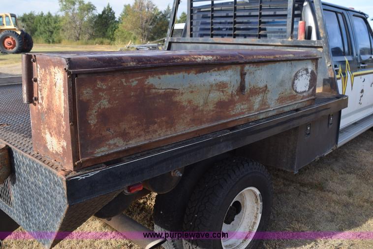 image for item L5003 1986 Ford F350 Crew Cab flatbed pickup truck