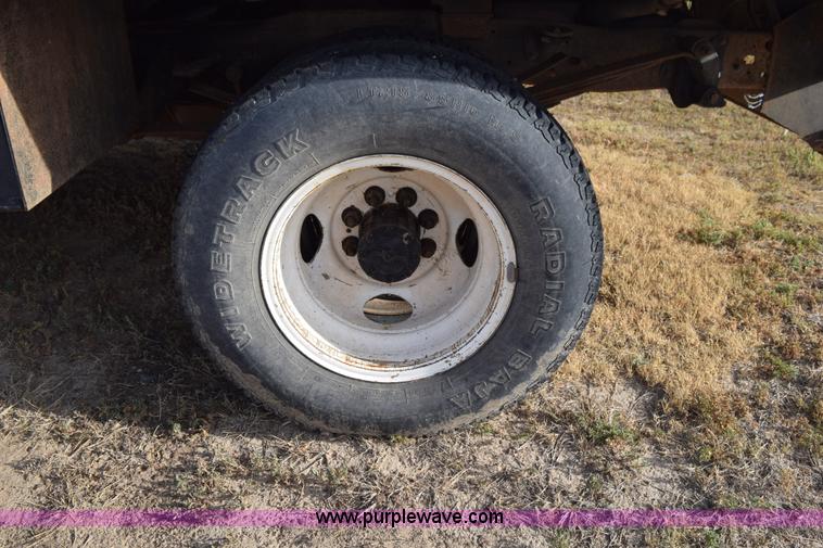 image for item L5003 1986 Ford F350 Crew Cab flatbed pickup truck