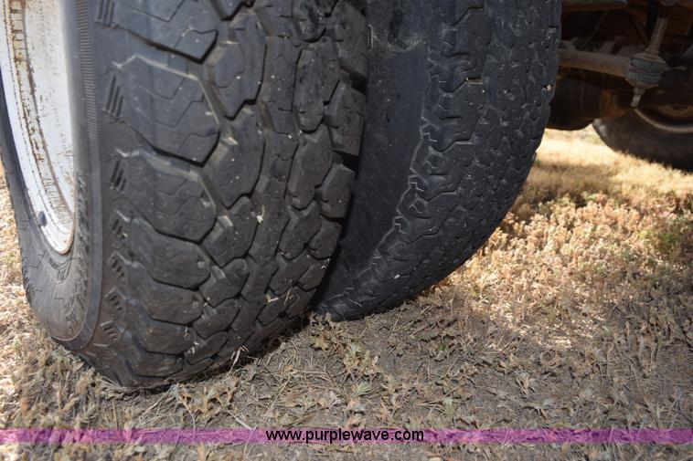 image for item L5003 1986 Ford F350 Crew Cab flatbed pickup truck