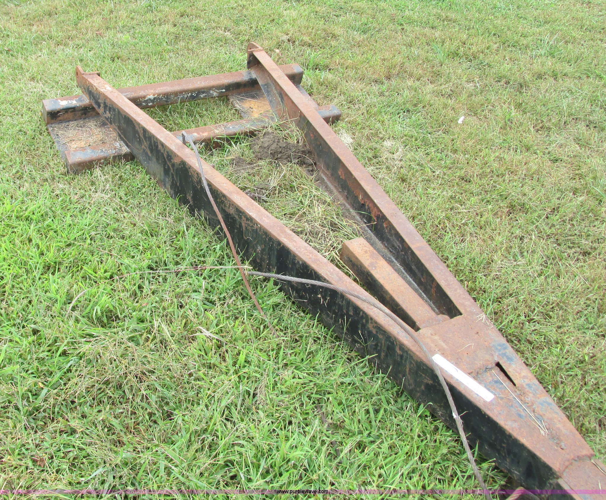 Skid steer extendable boom in Belton, MO Item K9446 sold Purple Wave