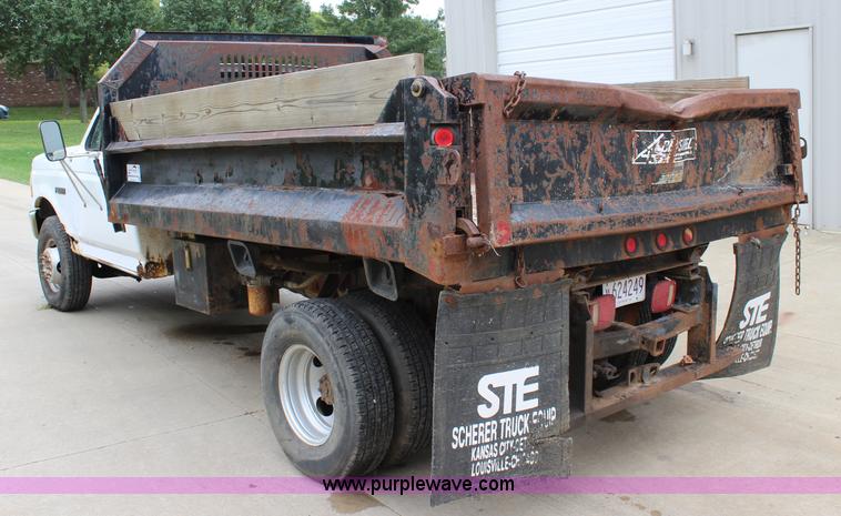 image for item J3628 1997 Ford F450 Super Duty dump flatbed truck