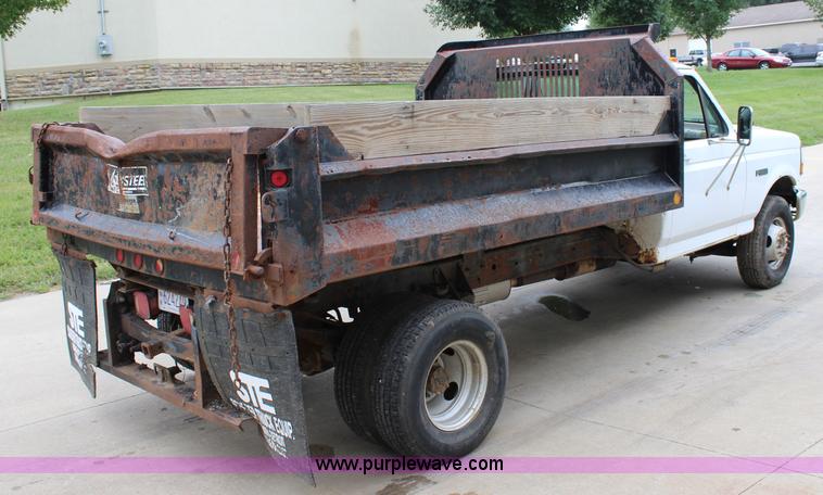 image for item J3628 1997 Ford F450 Super Duty dump flatbed truck