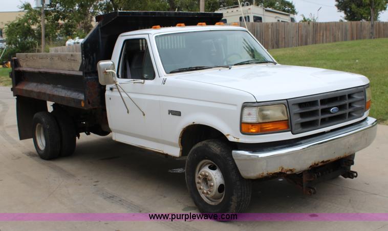 image for item J3628 1997 Ford F450 Super Duty dump flatbed truck