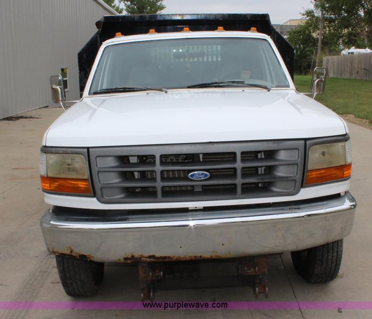 image for item J3628 1997 Ford F450 Super Duty dump flatbed truck