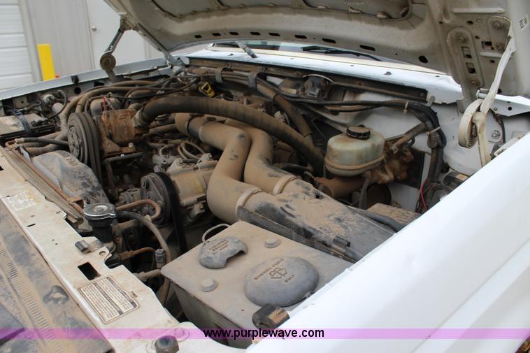 image for item J3628 1997 Ford F450 Super Duty dump flatbed truck