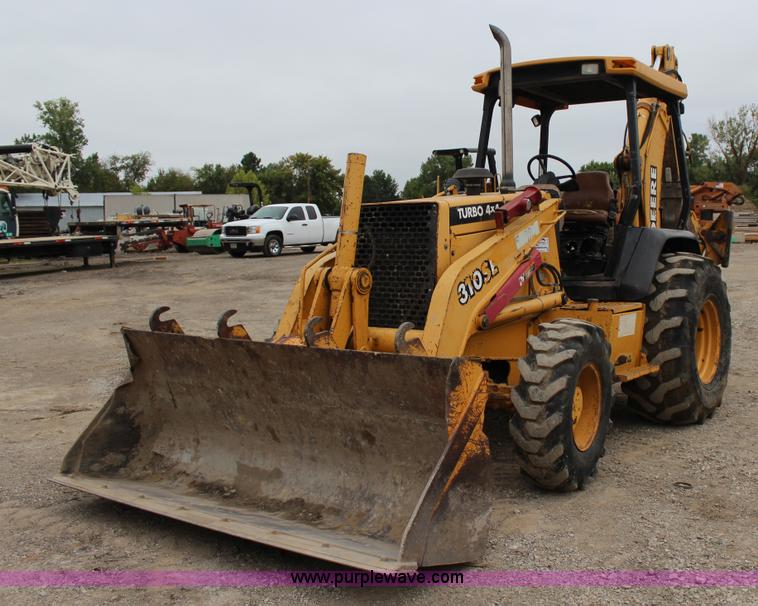 image for item J4370 2000 John Deere 310SE backhoe