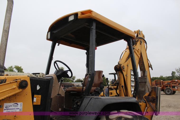 image for item J4370 2000 John Deere 310SE backhoe