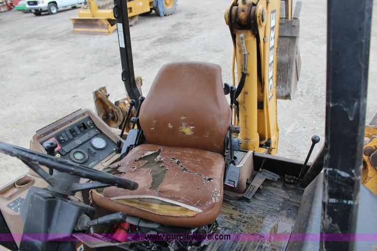 image for item J4370 2000 John Deere 310SE backhoe
