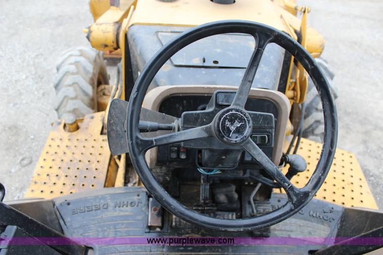 image for item J4370 2000 John Deere 310SE backhoe