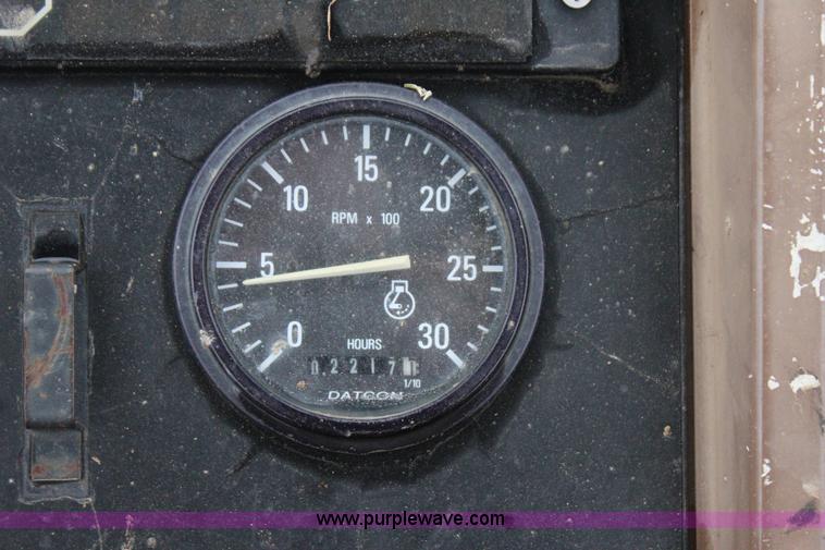 image for item J4370 2000 John Deere 310SE backhoe