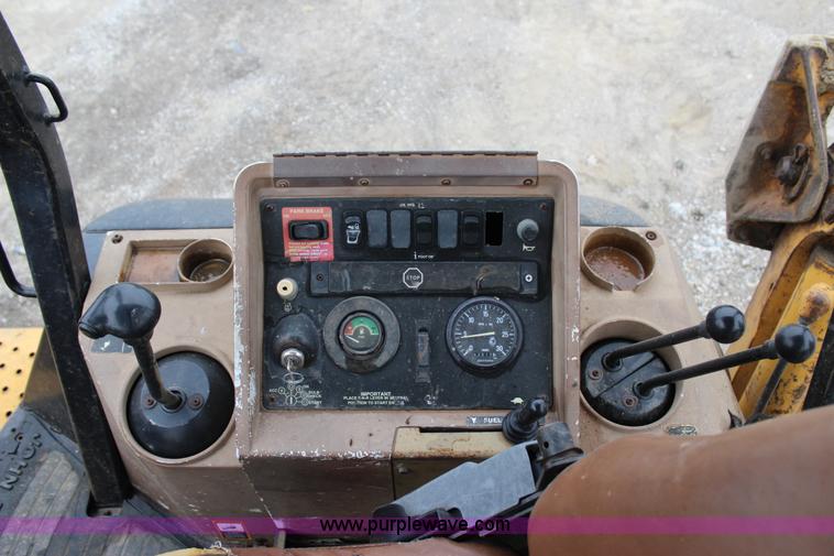 image for item J4370 2000 John Deere 310SE backhoe