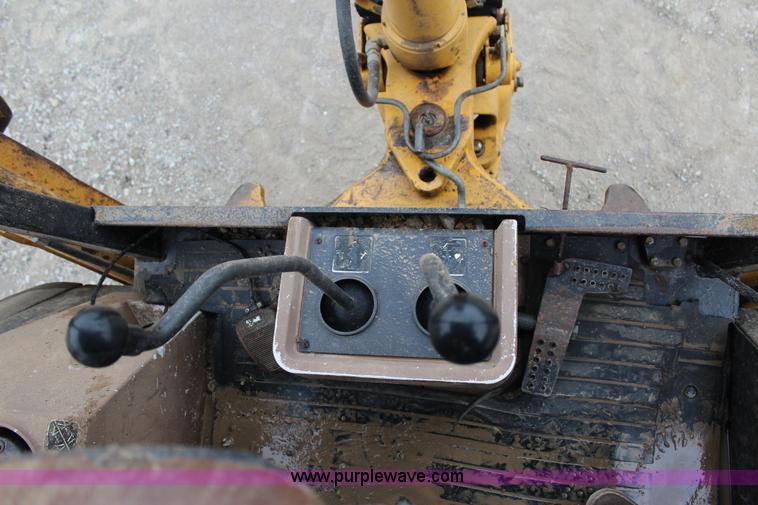 image for item J4370 2000 John Deere 310SE backhoe