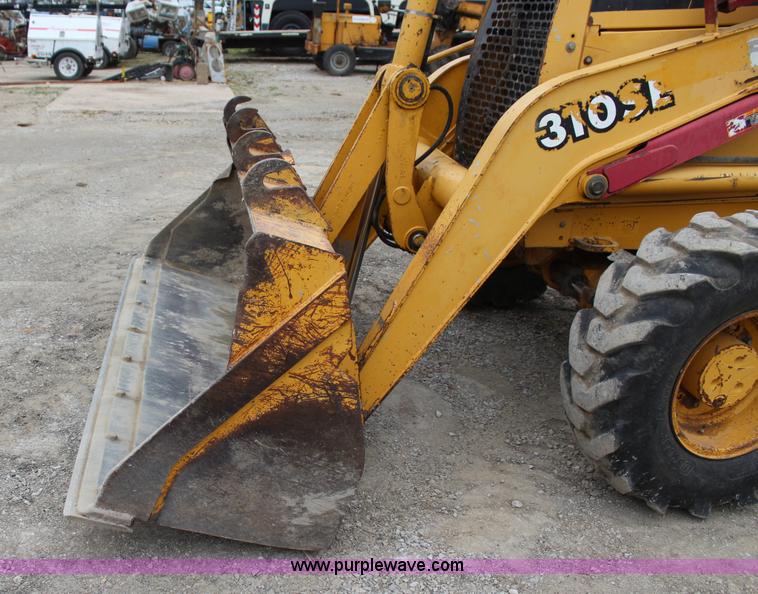 image for item J4370 2000 John Deere 310SE backhoe