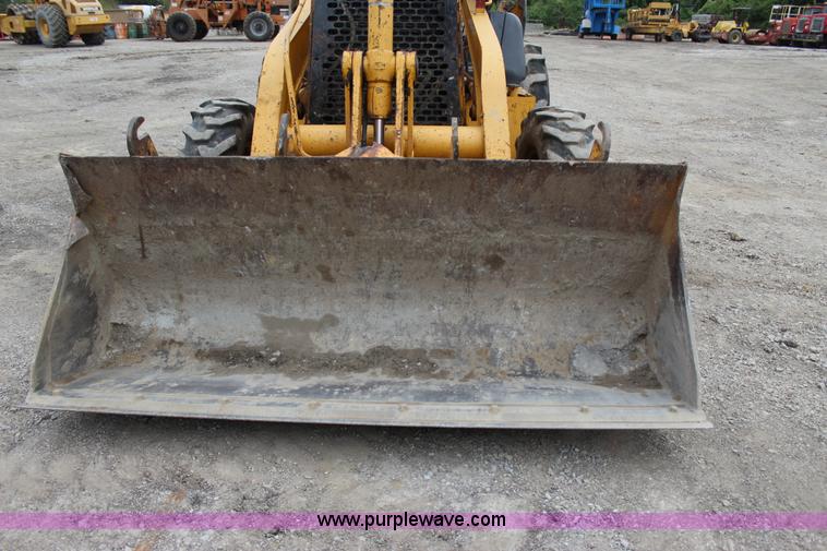 image for item J4370 2000 John Deere 310SE backhoe