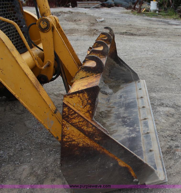 image for item J4370 2000 John Deere 310SE backhoe