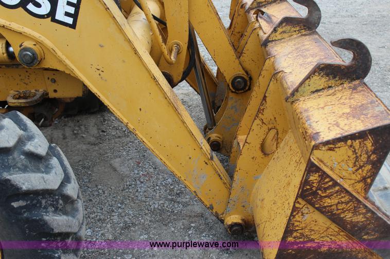 image for item J4370 2000 John Deere 310SE backhoe