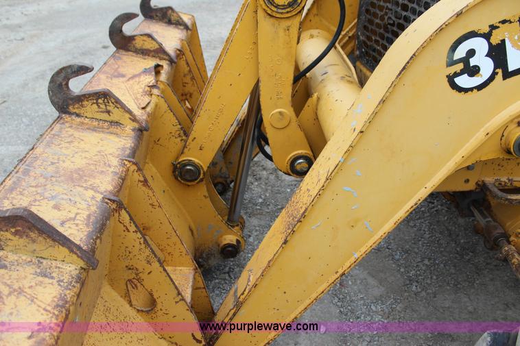 image for item J4370 2000 John Deere 310SE backhoe