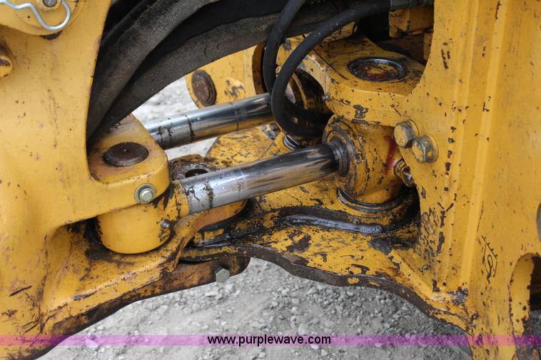 image for item J4370 2000 John Deere 310SE backhoe