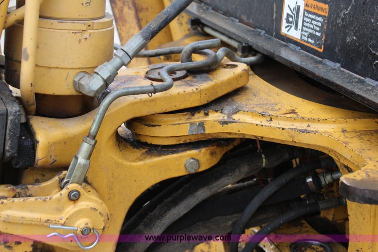 image for item J4370 2000 John Deere 310SE backhoe