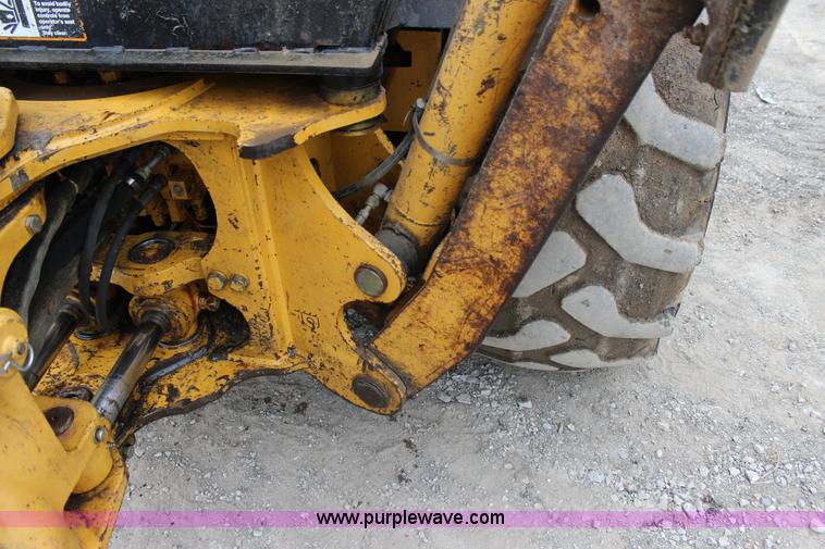 image for item J4370 2000 John Deere 310SE backhoe