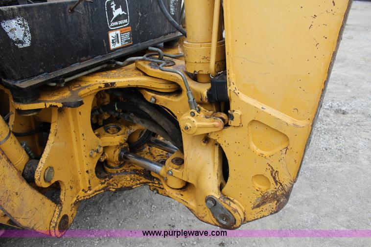 image for item J4370 2000 John Deere 310SE backhoe