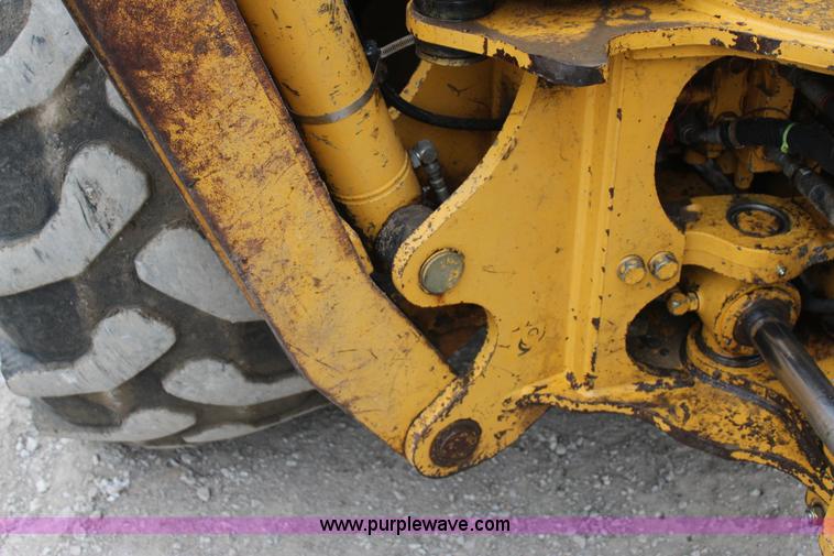 image for item J4370 2000 John Deere 310SE backhoe