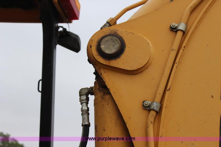 image for item J4370 2000 John Deere 310SE backhoe