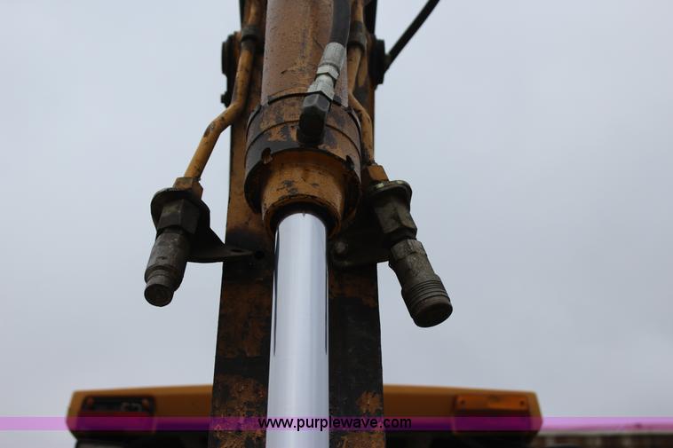 image for item J4370 2000 John Deere 310SE backhoe