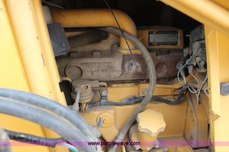 image for item J4370 2000 John Deere 310SE backhoe