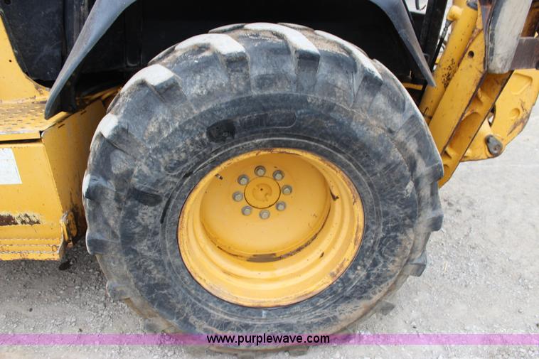 image for item J4370 2000 John Deere 310SE backhoe