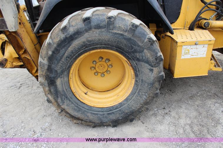 image for item J4370 2000 John Deere 310SE backhoe