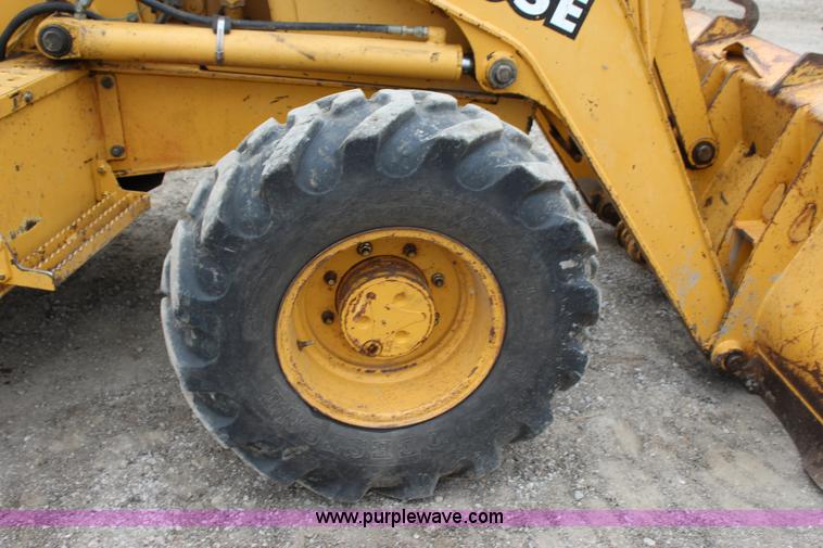 image for item J4370 2000 John Deere 310SE backhoe