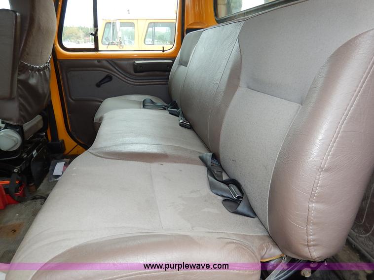 image for item J6377 2002 International 4900 Crew Cab dump truck